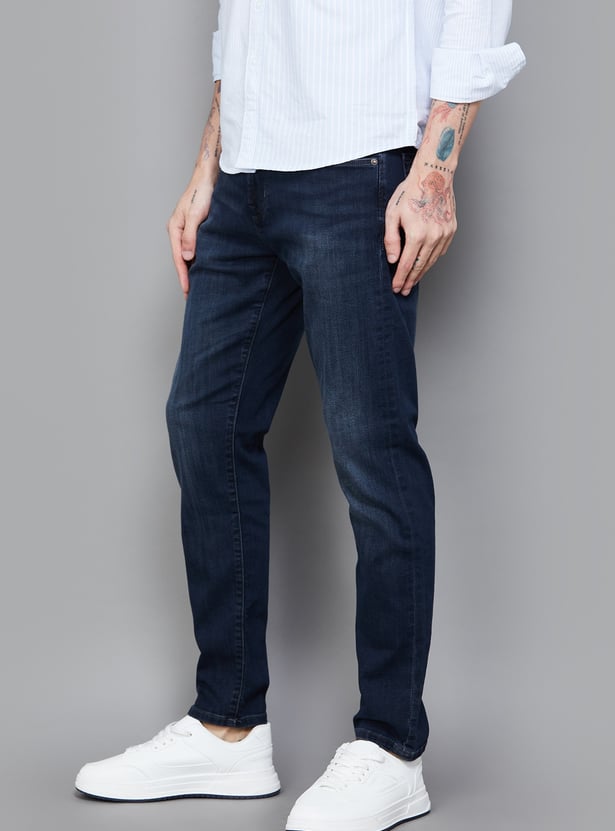 FLYING MACHINE Solid Dark Wash Slash Jeans (Slim Tapered)