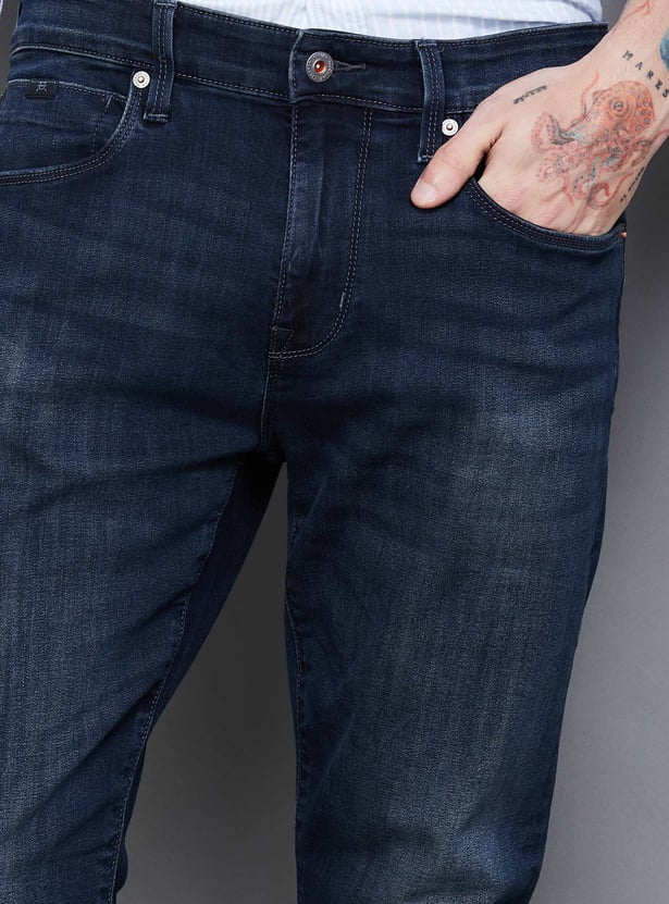 FLYING MACHINE Solid Dark Wash Slash Jeans (Slim Tapered)