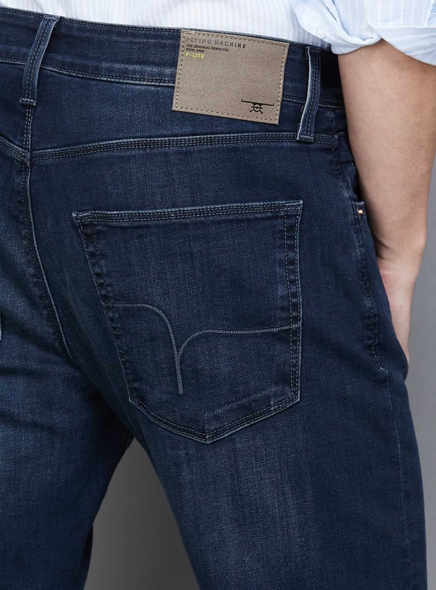 FLYING MACHINE Solid Dark Wash Slash Jeans (Slim Tapered)