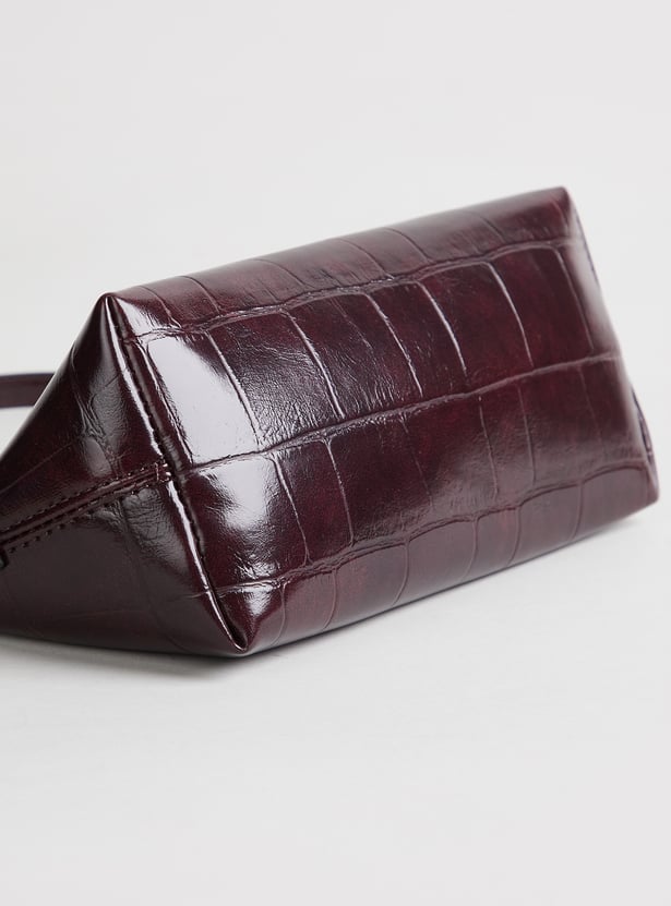 GINGER Embossed Sling Bag