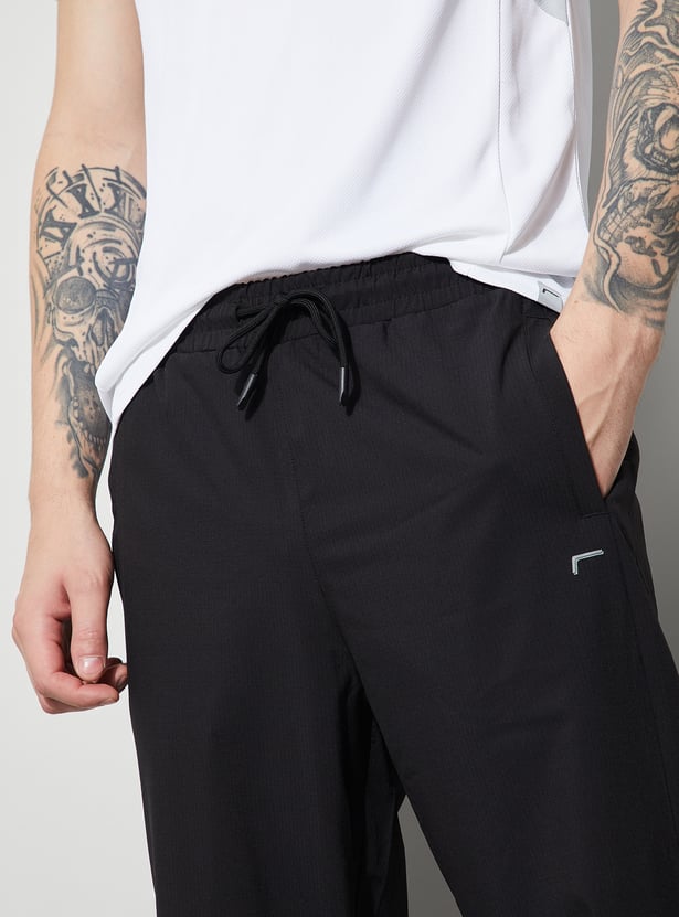 FAME FOREVER Solid Relaxed Track Pants