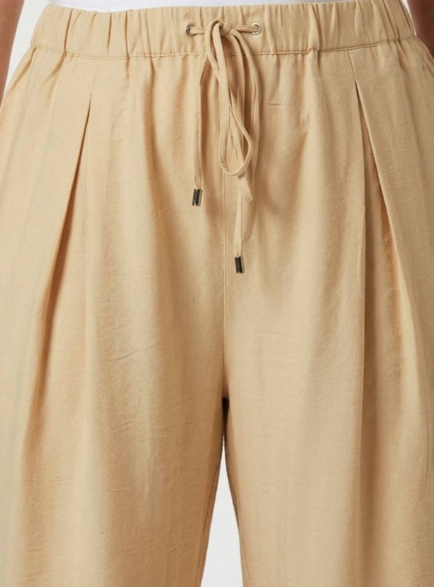 NEXUS Pleated Mid-Rise Trousers