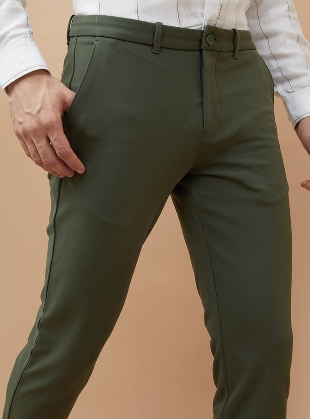 Buy CODE Men Solid Slim Tapered Casual Trousers from CODE at just INR ...