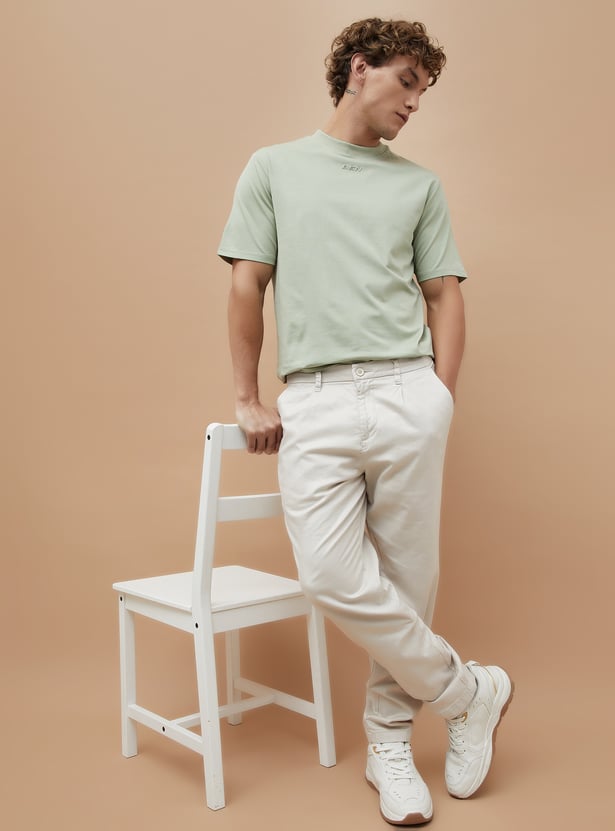 Buy BOSSINI Solid Oversized T-shirt from Bossini at just INR 799.0