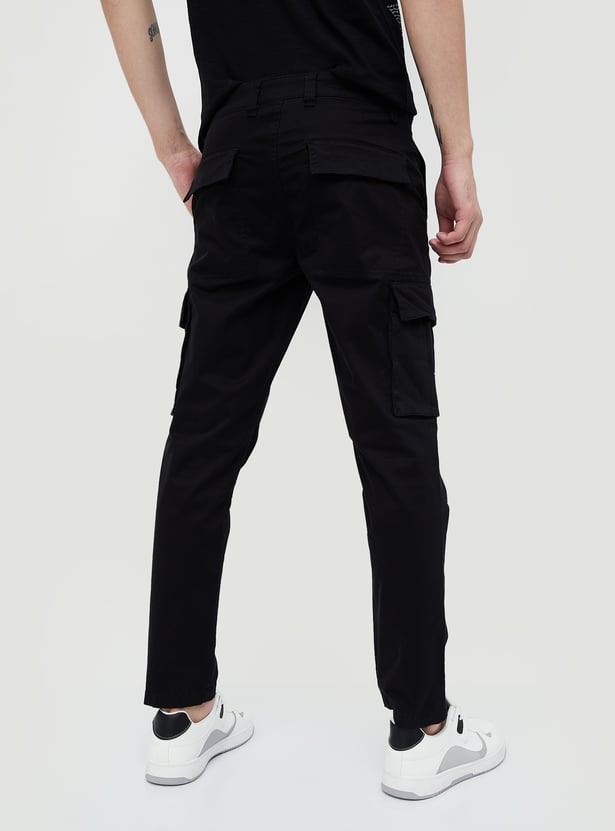 Buy FORCA Men Solid Regular Fit Cargo Trousers from Forca at just 