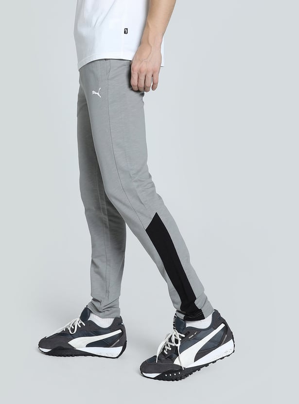 Buy PUMA Men Contrast Paneled Regular Fit Track Pants from PUMA at just INR 2999.0