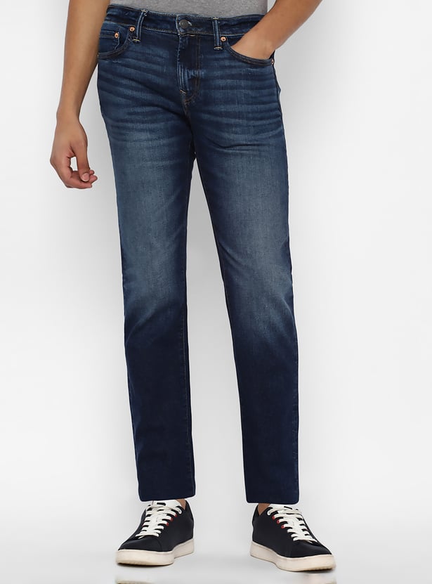 Buy AMERICAN EAGLE Washed Slim Straight Jeans from American Eagle