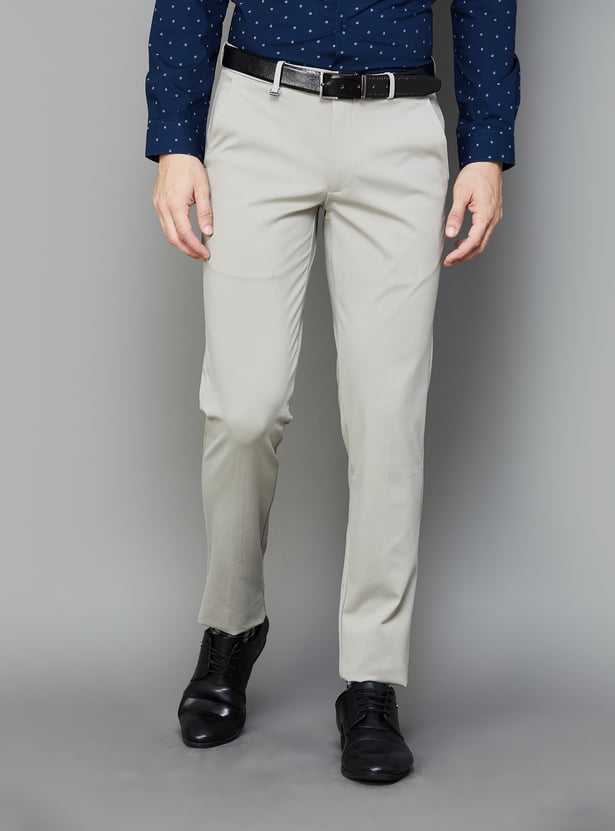 Buy VAN HEUSEN Men Solid Super Slim Formal Trousers from Van Heusen at ...