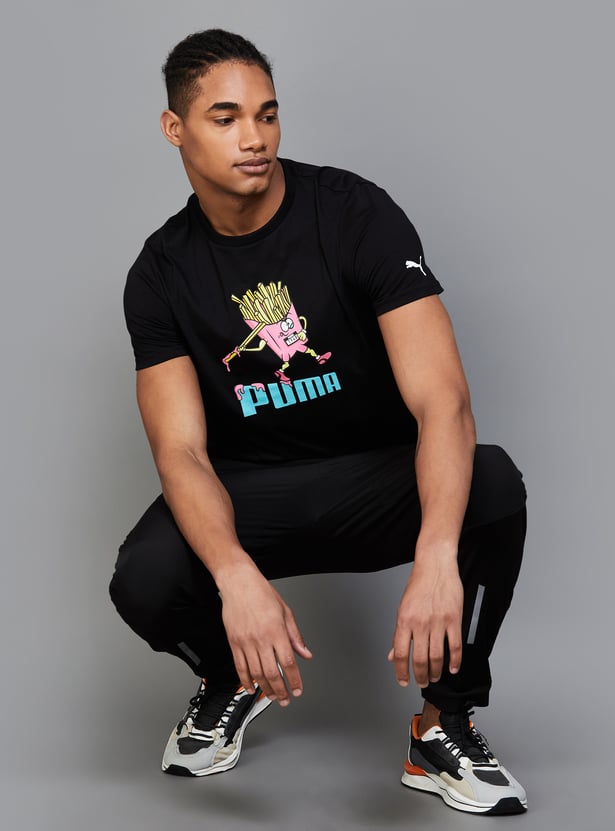 Buy PUMA Graphic Printed Sports T-shirt from PUMA at just INR