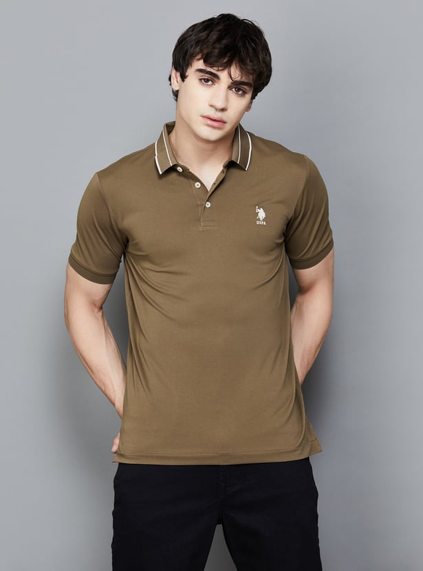 Buy US POLO ASSN Solid Polo T-shirt from US Polo Assn at just INR
