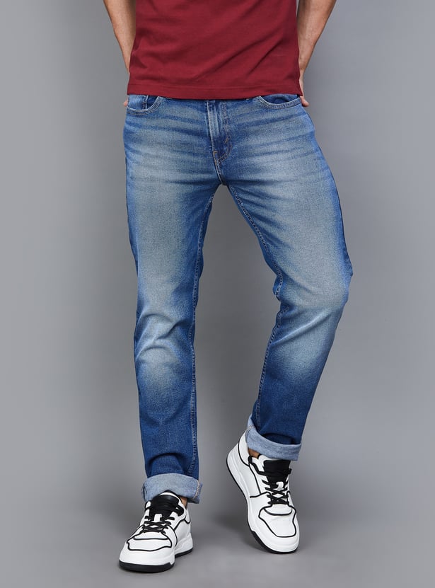 Buy LEVI'S 511 Washed Slim Fit Jeans from Levi's at just INR