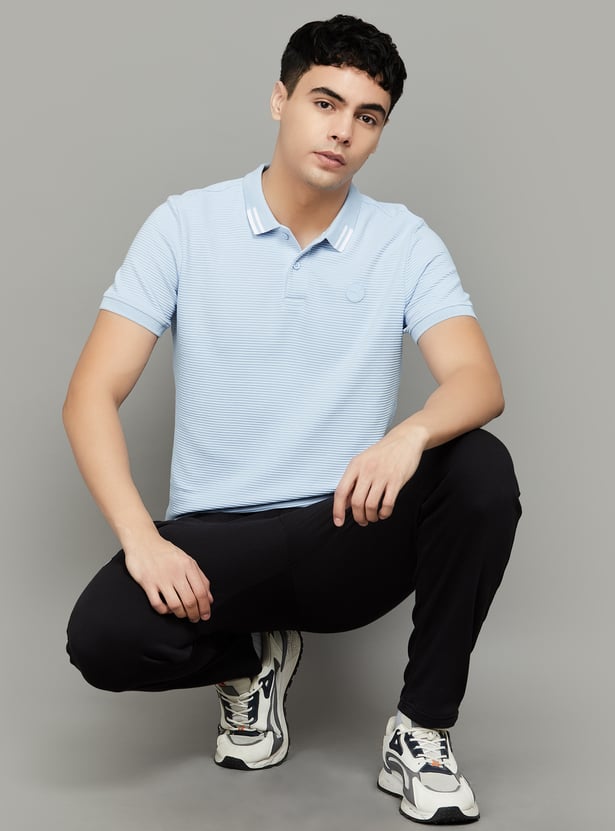 Buy PUMA Striped Regular Fit Sports T-shirt from PUMA at just INR