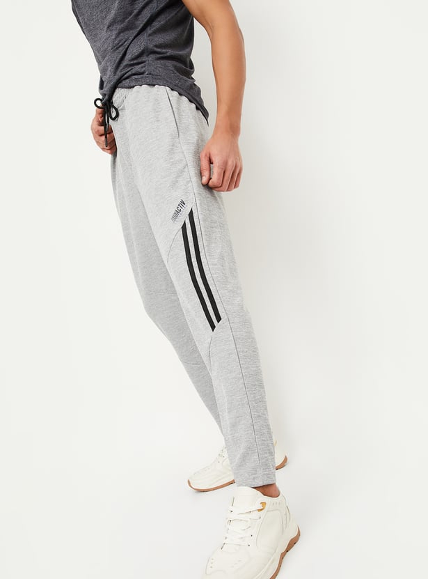 Buy Men Solid Athleisure Joggers Online at just
