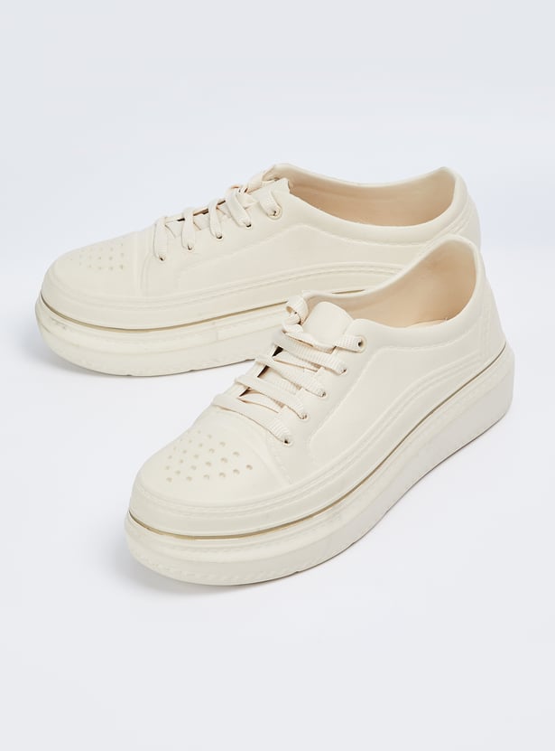Buy Women Moulded Wash Wear Sneakers Online at just