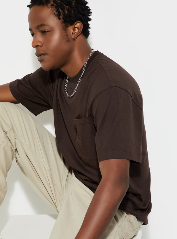 Buy URB_N Men Oversized Solid T-shirt Online at just Rs. 399.0