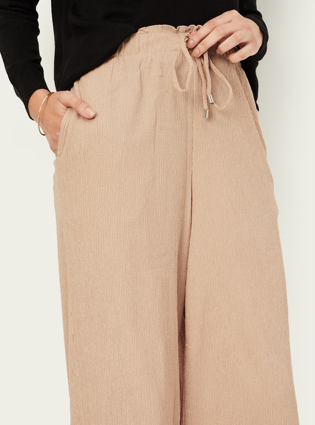 Women Textured Knit Flared Trousers