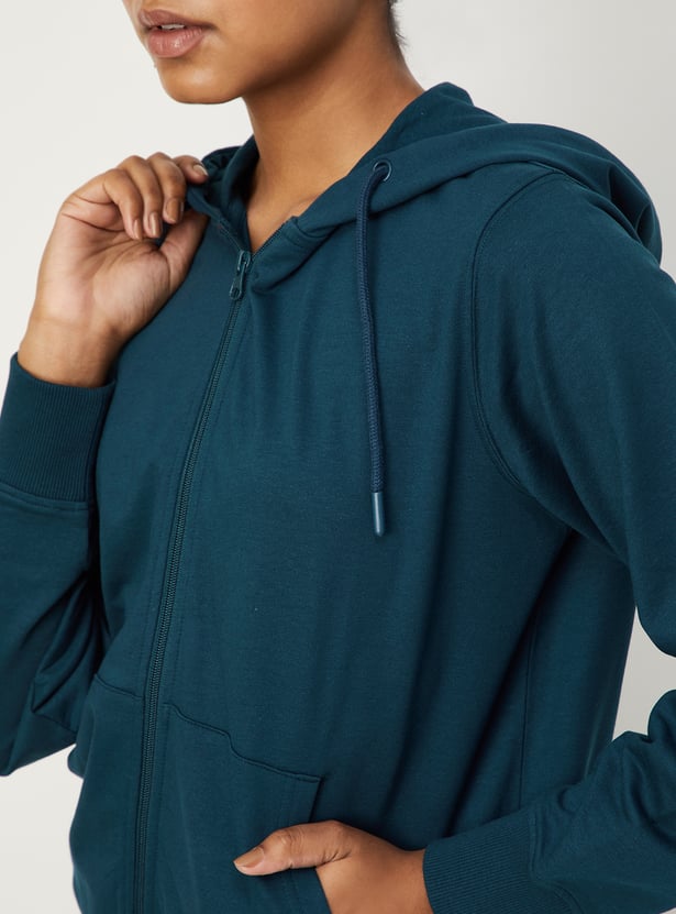 Women Solid Hooded Sweatshirt