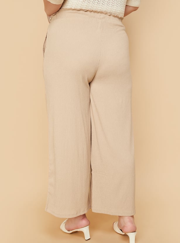 Women Textured Knit Flared Trousers