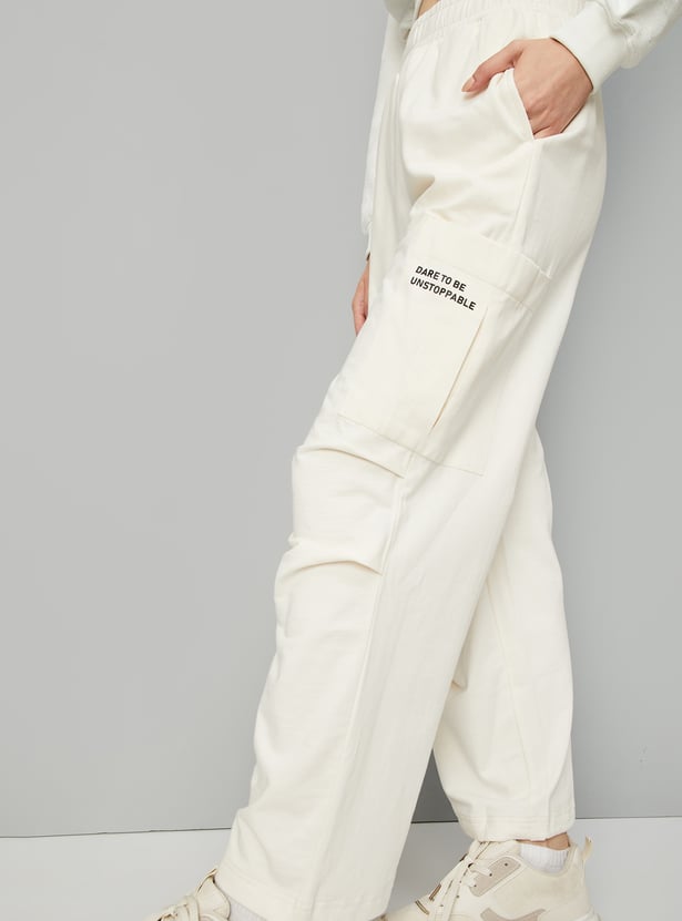 Buy Women Solid Cargo Trousers Online at just Rs. 999.0