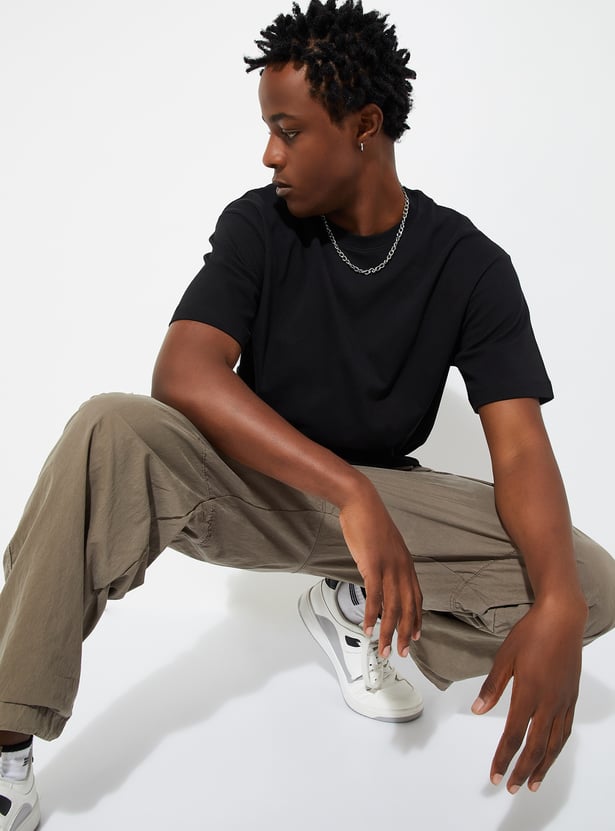 Buy URB_N Men Relaxed Fit Solid T-shirt Online at just Rs. 399.0