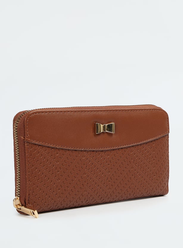 Buy Women Textured Zip Around Wallet Online at just Rs. 599.0