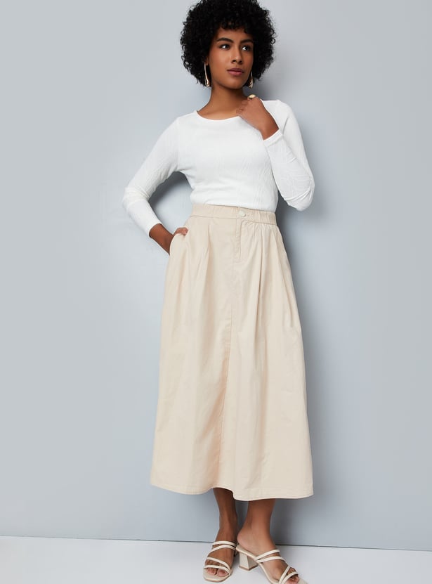 Buy Women Solid A-Line Midi Skirt Online at just Rs. 999.0