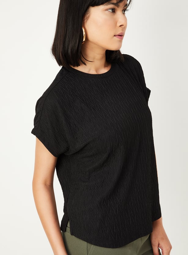 Buy Women Textured Knit Top Online at just Rs. 699.0