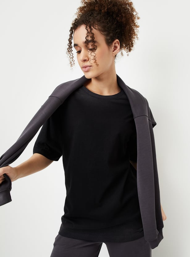 Buy Women Oversized Washed Athleisure T-shirt Online at just Rs