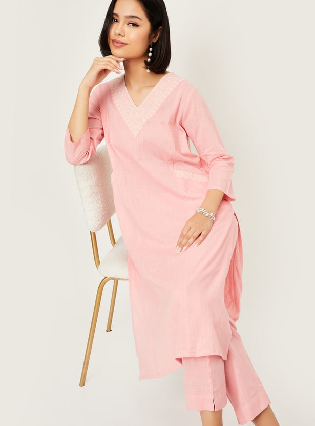 Women Rust Embroidered Straight Kurta Trousers Set