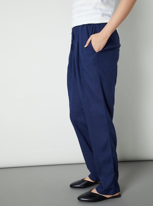 Women Solid Tapered Fit Trousers
