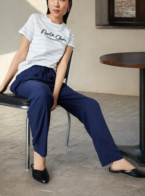 Women Solid Tapered Fit Trousers