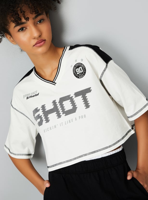 Buy Women Printed Boxy Fit Crop Sports T-shirt Online at just Rs