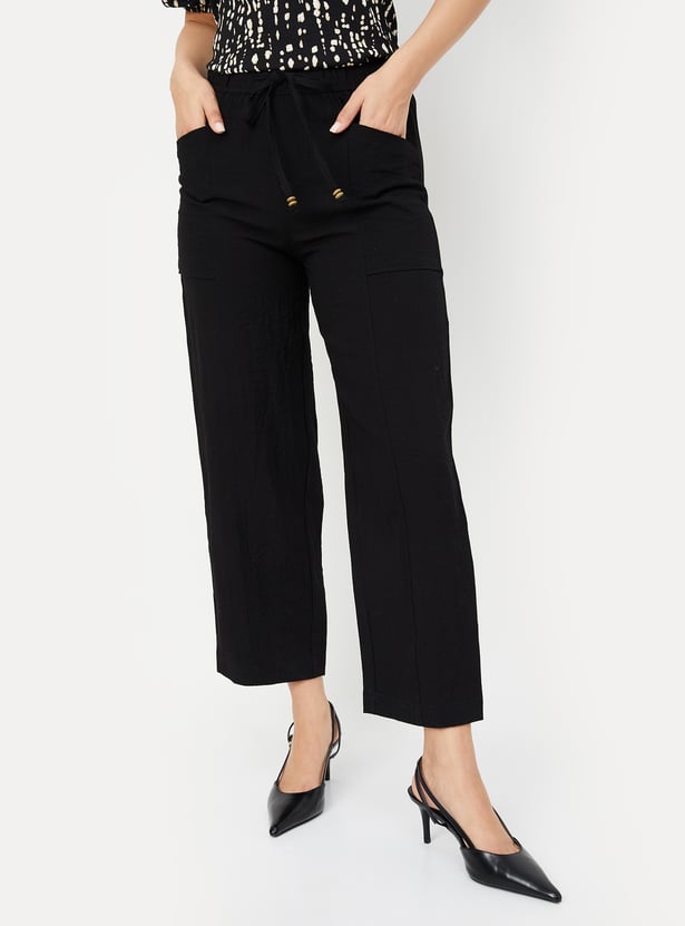 Buy Women Textured Wide-Leg Trousers Online at just Rs. 1199.0