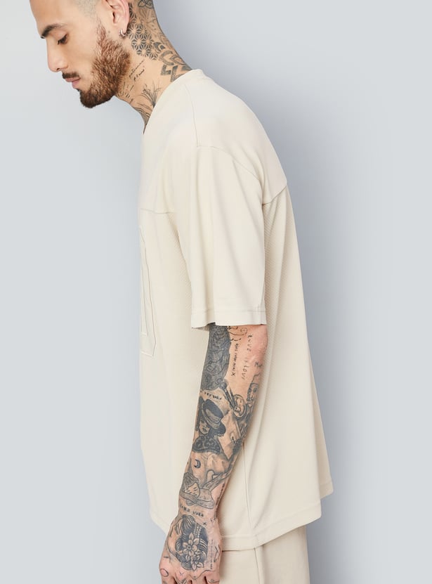 Men Textured Oversized Sports T-shirt