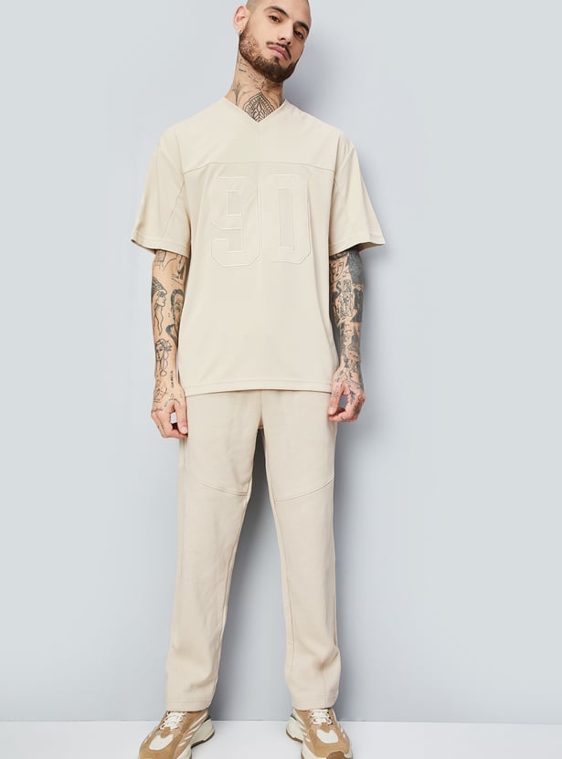 Men Textured Oversized Sports T-shirt