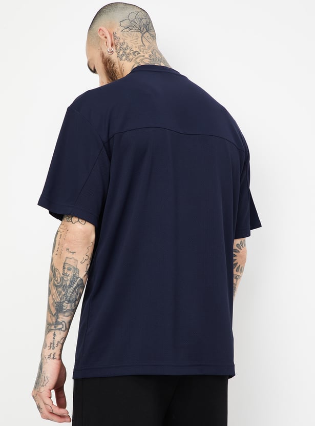 Men Textured Oversized Sports T-shirt