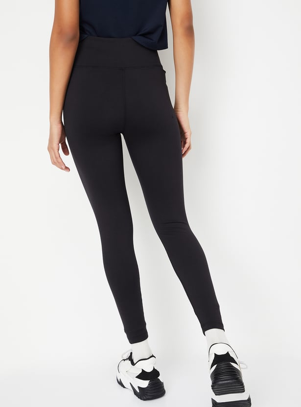 Women Solid Skinny Fit Tights