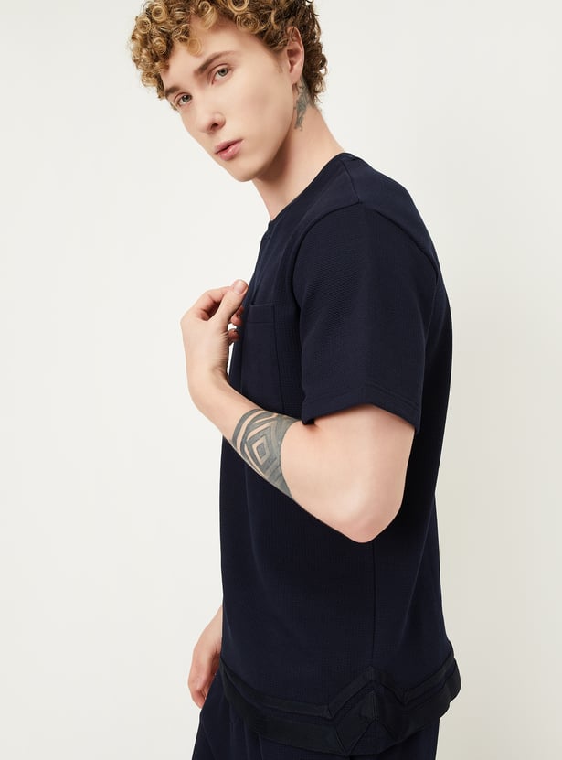 Men Textured Oversized Sports T-shirt