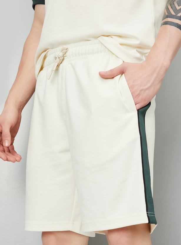 Men Solid Side Taped Shorts