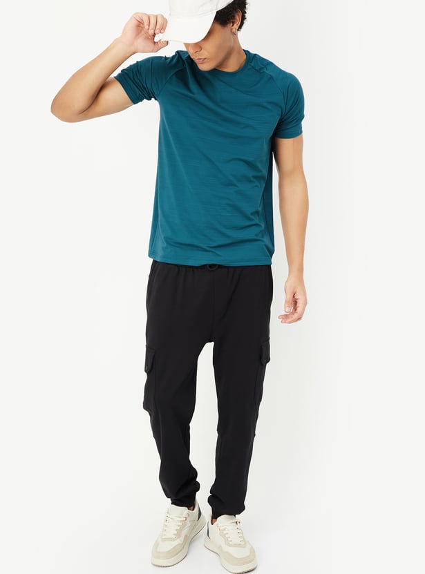 Men Solid Slim Fit Sports T-shirt