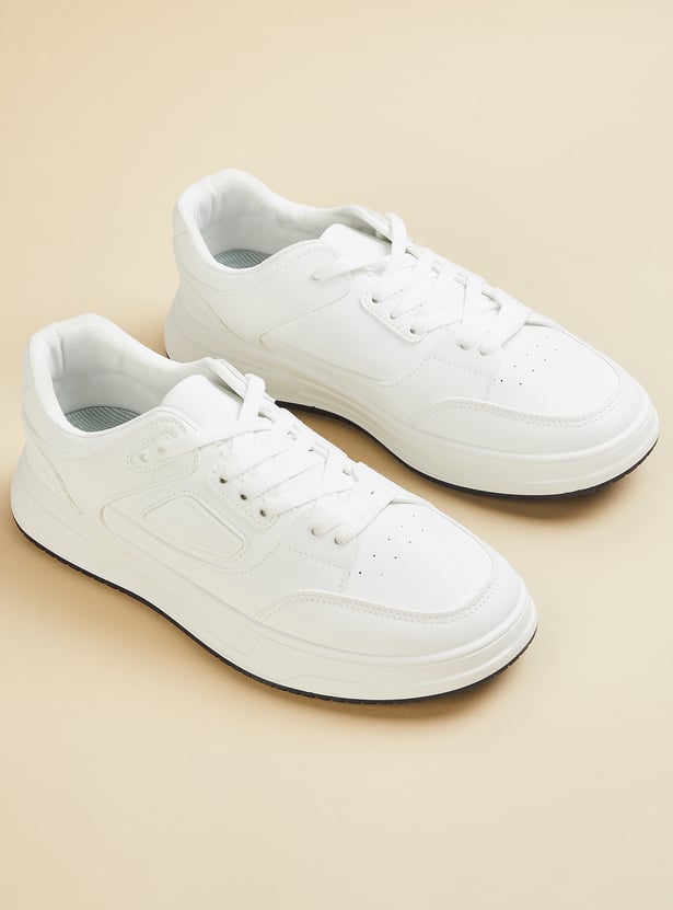 Buy Men Panelled Sneakers Online at just Rs. 1099.0