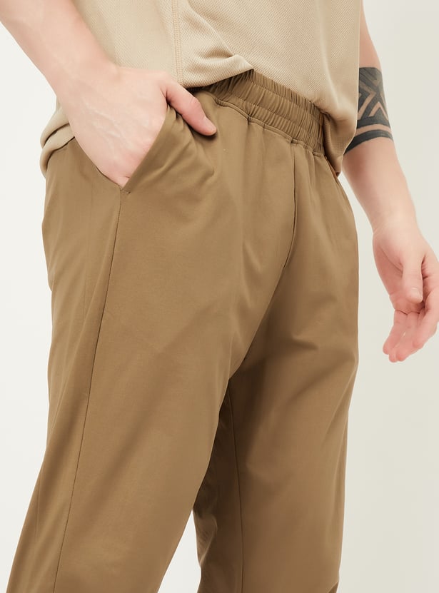 Men Solid Slim Fit Track Pants