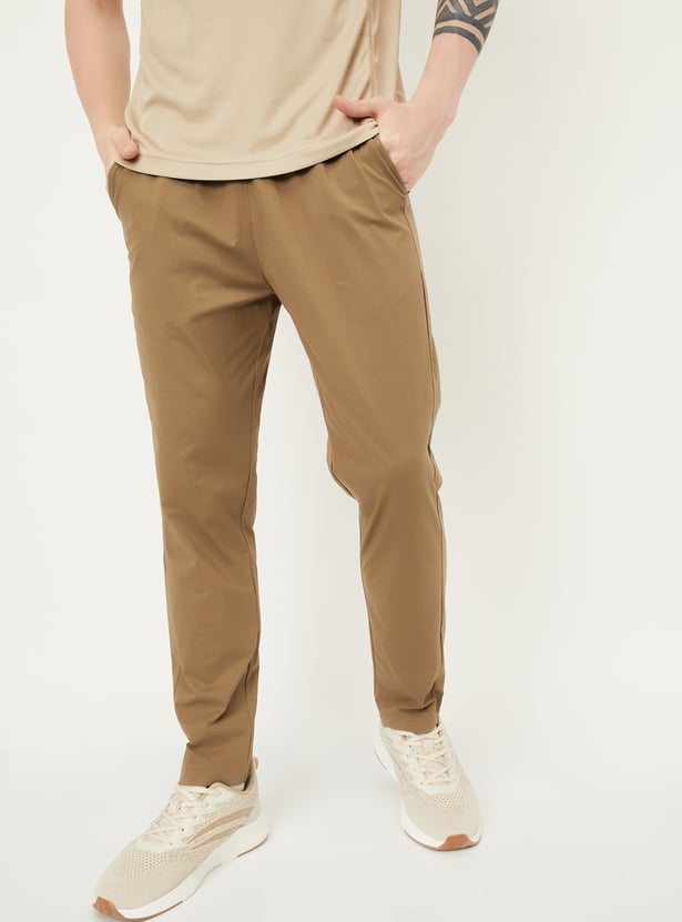 Men Solid Slim Fit Track Pants