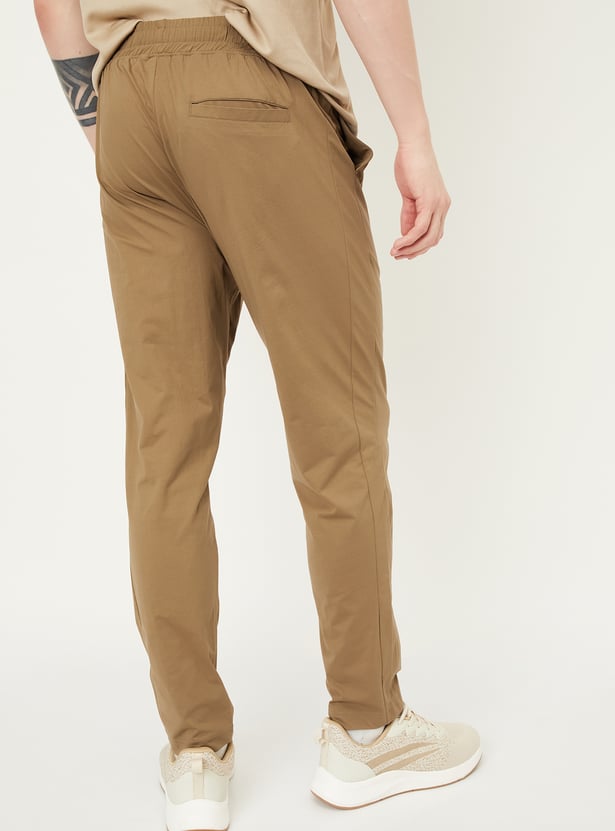 Men Solid Slim Fit Track Pants