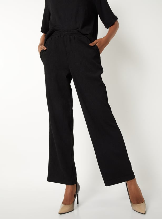 Buy Women Textured Comfort Fit Trousers Online at just Rs. 699.0