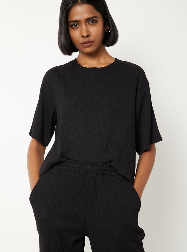 Buy Women Textured T-shirt Online at just Rs. 399.0