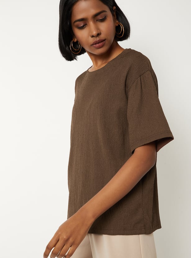 Buy Women Textured T-shirt Online at just Rs. 399.0