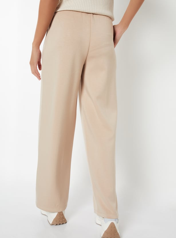 Women Solid Buttersoft Sports Track Pants