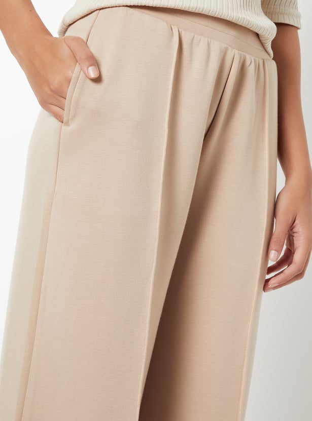 Women Solid Buttersoft Sports Track Pants