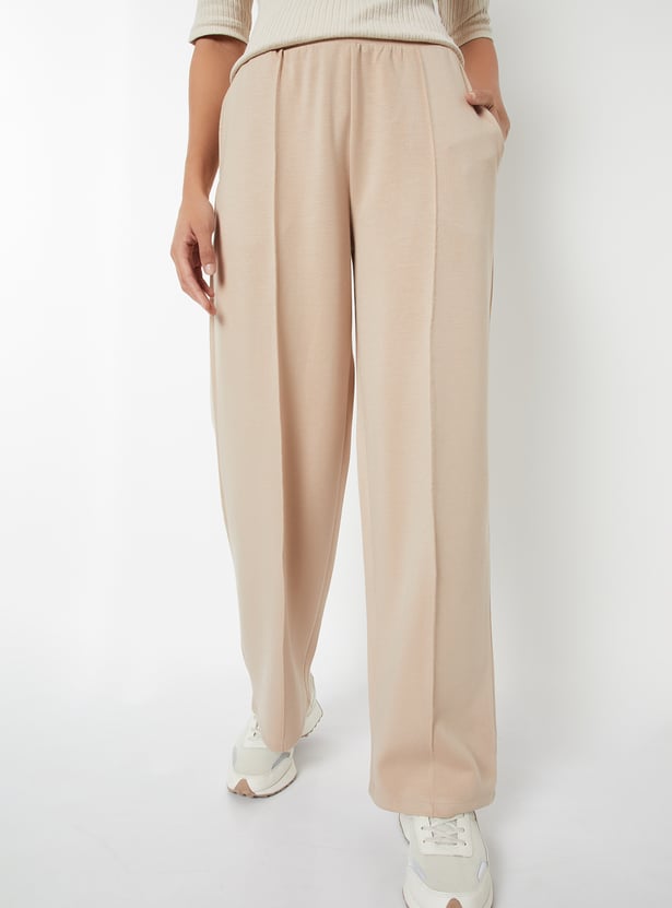 Women Solid Buttersoft Sports Track Pants